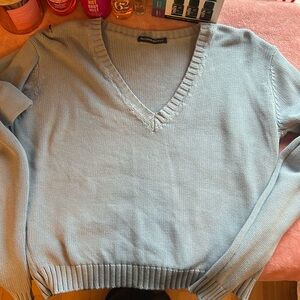 Brandy Melville 
Light blue 
Sweater 
Great Condition
